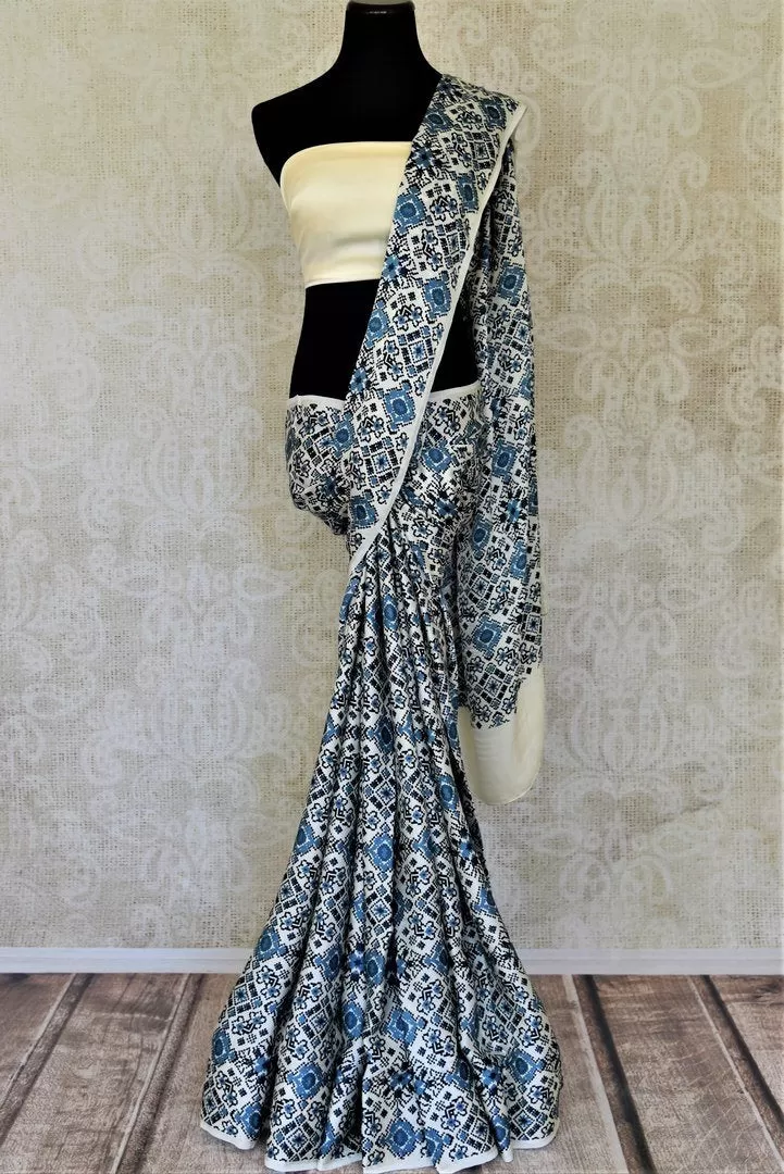 90I757-RO Cream and Blue Printed Crepe Silk Saree