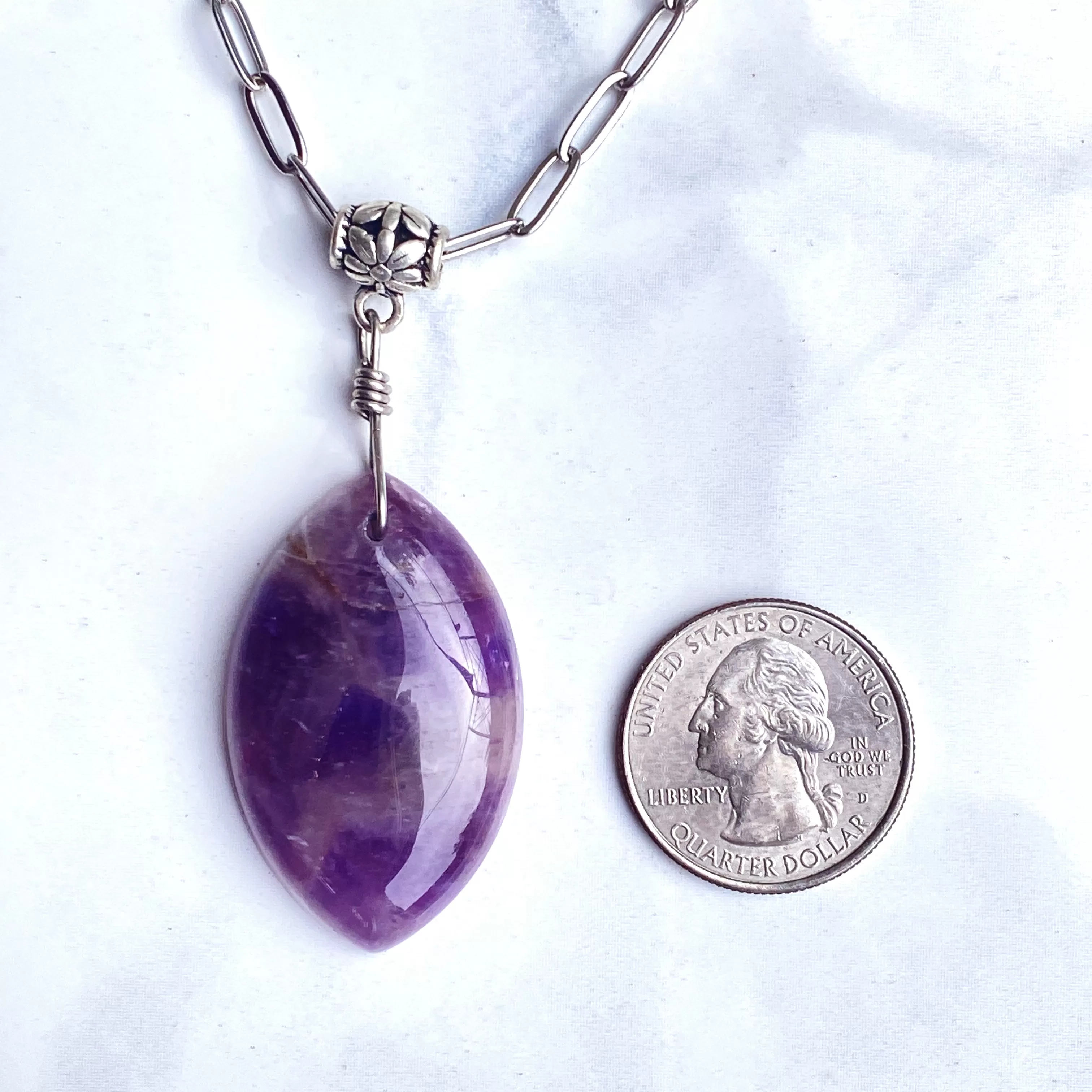 Amethyst gemstone pendant on Stainless steel