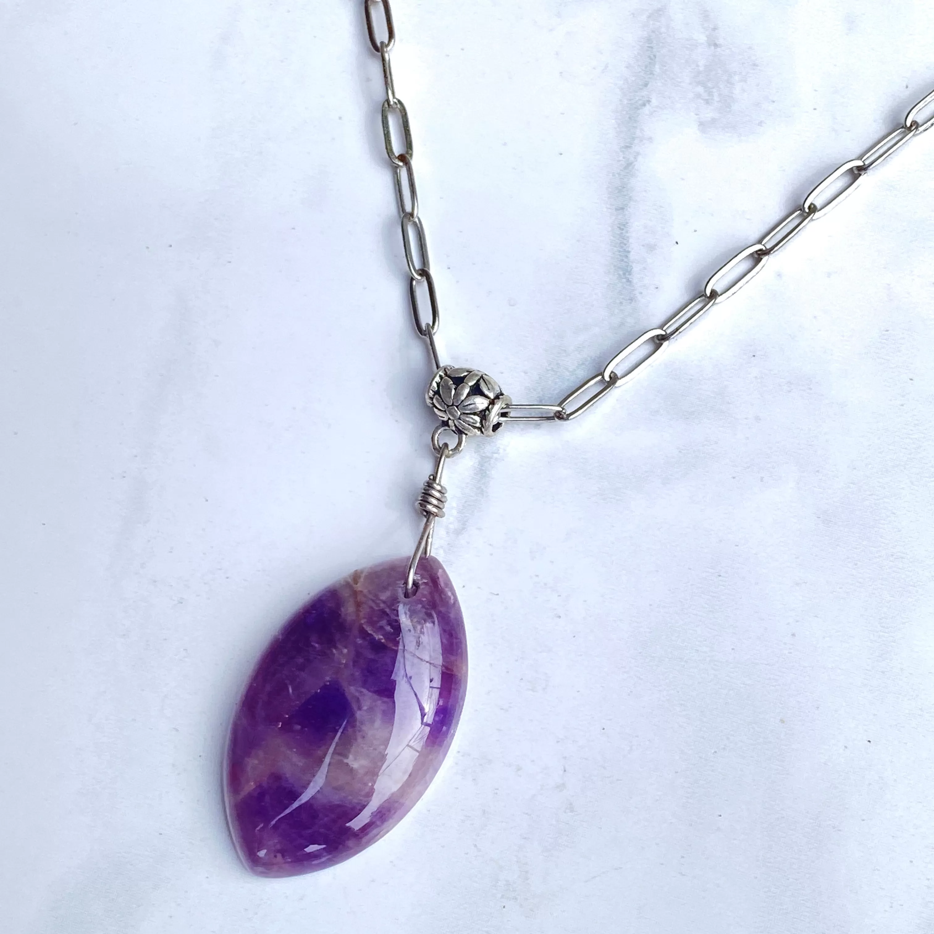 Amethyst gemstone pendant on Stainless steel