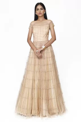 Nude symmetrical box embroidered gown.